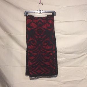 Red skirt with black lace overlay